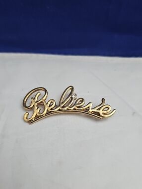 "Believe" Gold Script Brooch with Clear Stone